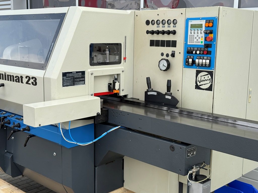 Vierseitenhobelmaschine WEINIG Typ Unimat 23 E