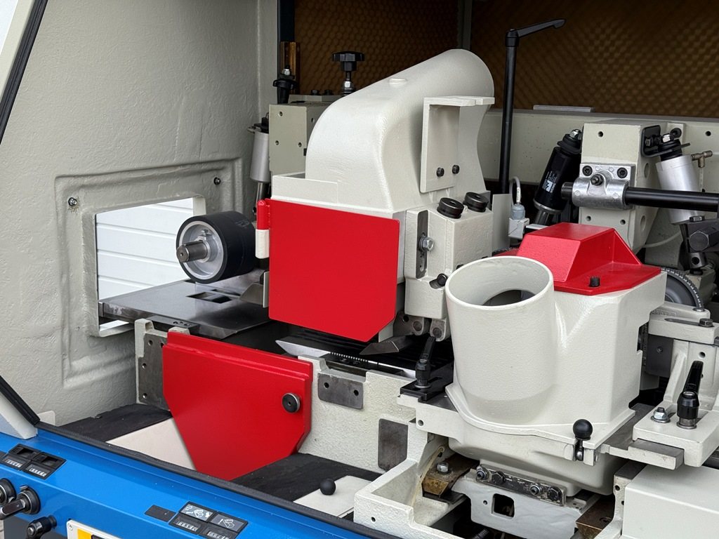 Vierseitenhobelmaschine WEINIG Typ Unimat 23 E