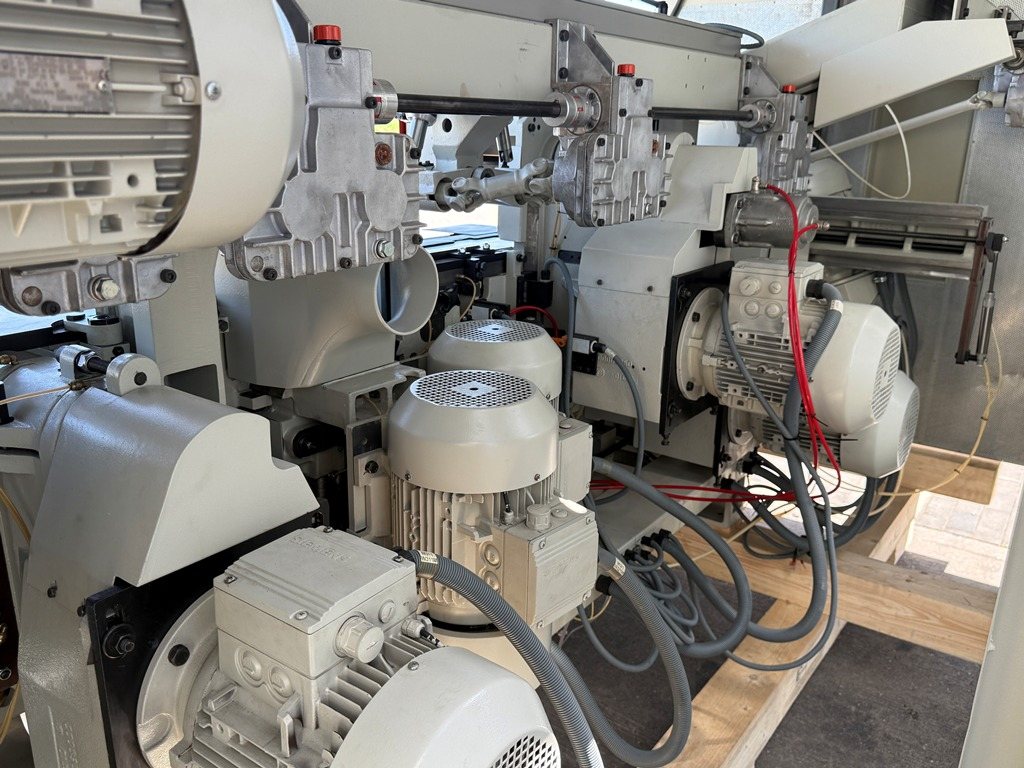Vierseitenhobelmaschine WEINIG Typ Unimat 23 EL